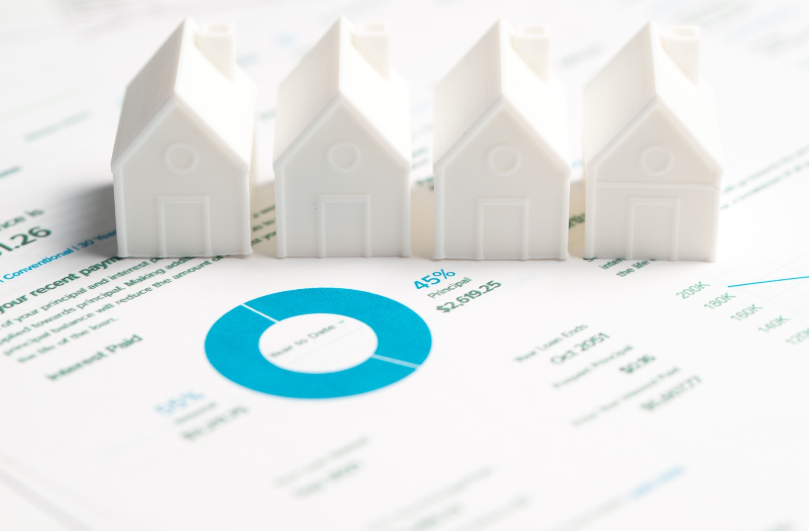 Mortgage loan statement with a white model house. The statement showing principal and interest ratio, represents concepts of homeownership, mortgage payments, and financial planning.